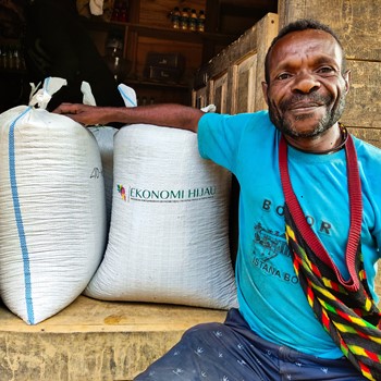 Andreas Tekege & 100 Kg Of Coffee That Will Be Transported From Modio To Nabire