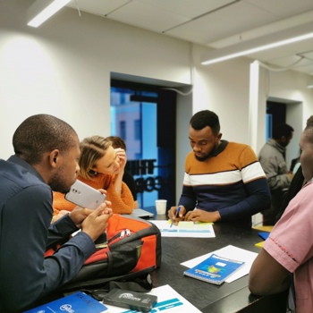 People sitting around desk